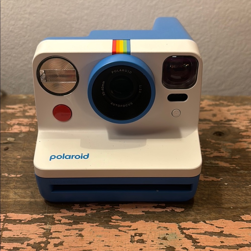 Polaroid White and Blue Simulated Camera with Retro Design and Rainbow Stripe